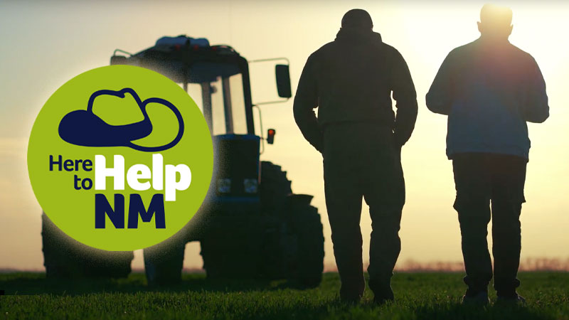 Here to Help Logo with two farmers walking together